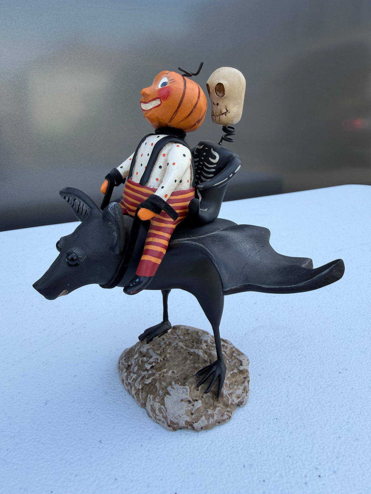 Pumpkin Head Riding Bat Halloween Figurine