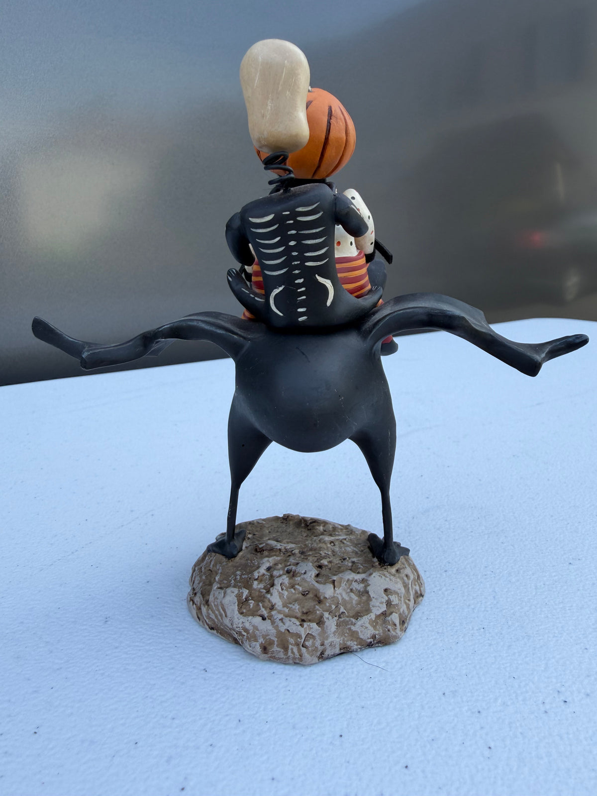Pumpkin Head Riding Bat Halloween Figurine